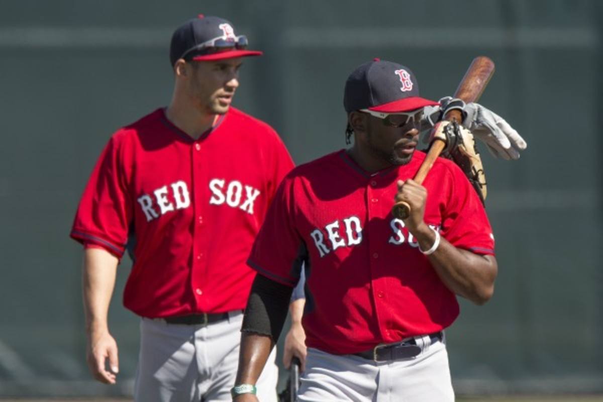 The veteran Grady Sizemore (left) beat out prospect Jackie Bradley Jr. (right). (Michael Ivins/Getty Images)
