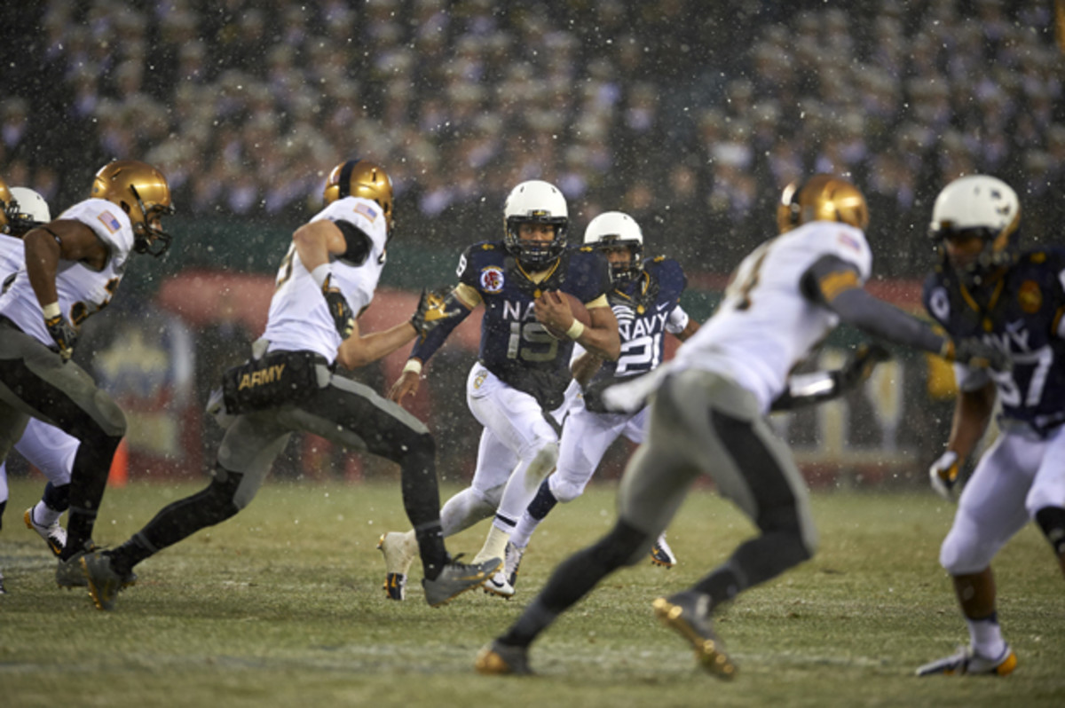 The speedy QB from Navy set a new NCAA college football record for rushing touchdowns by a quarterback last fall when he ran for 31 TDs, leading the Midshipmen to a 9-4 record.
