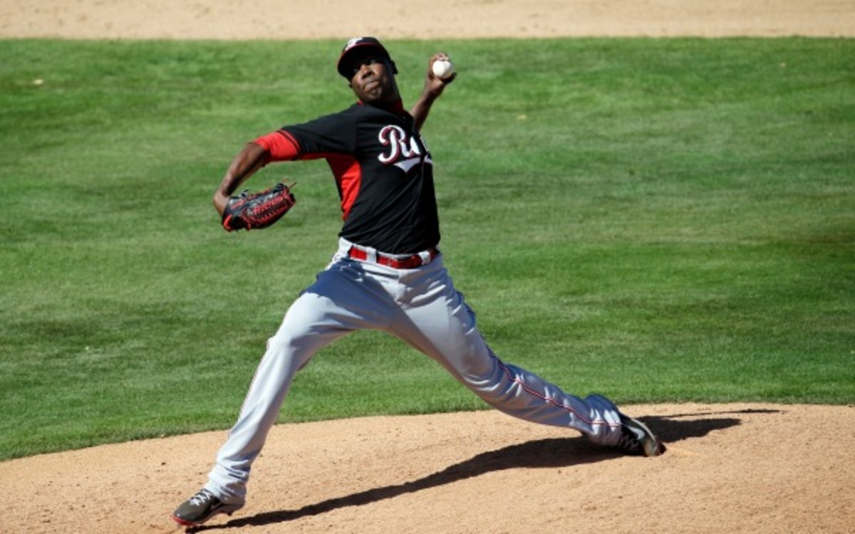 Cincinnati Reds' Aroldis Chapman throws during an exhibition game. (AP Photo/Morry Gash)