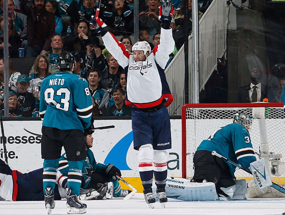 Dustin Penner (center) helped the Capitals end a two-decade winless streak in San Jose. (Don Smith/Getty Images)