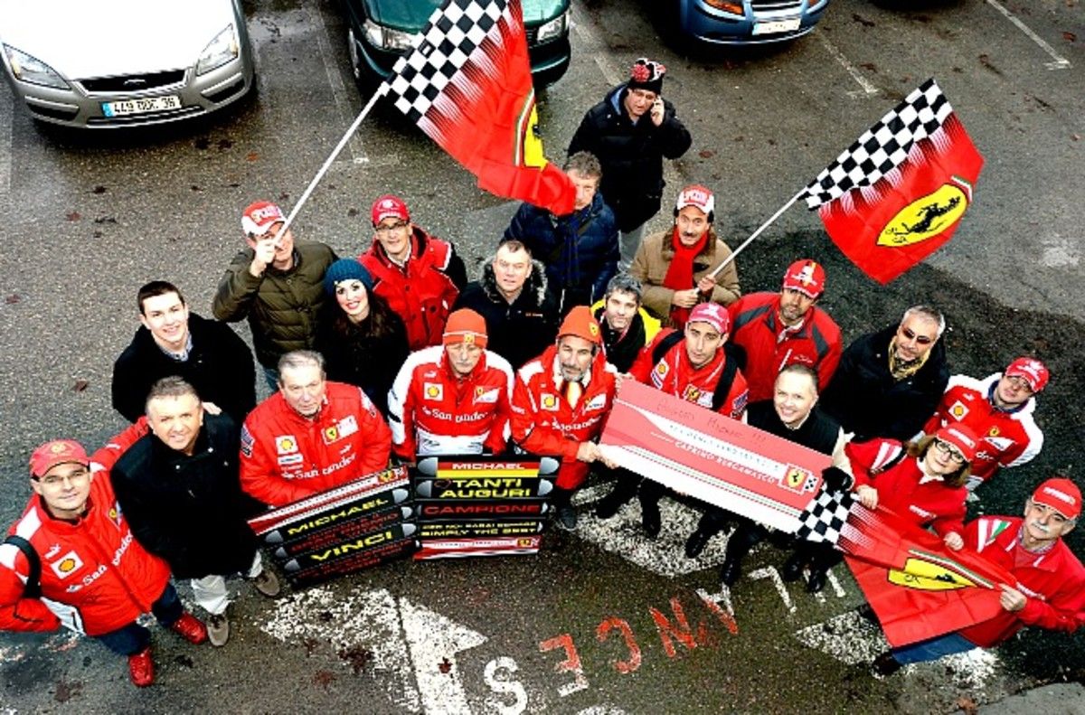 Fans of Michael Schumacher gathered outside the hospital where he remains in a coma.