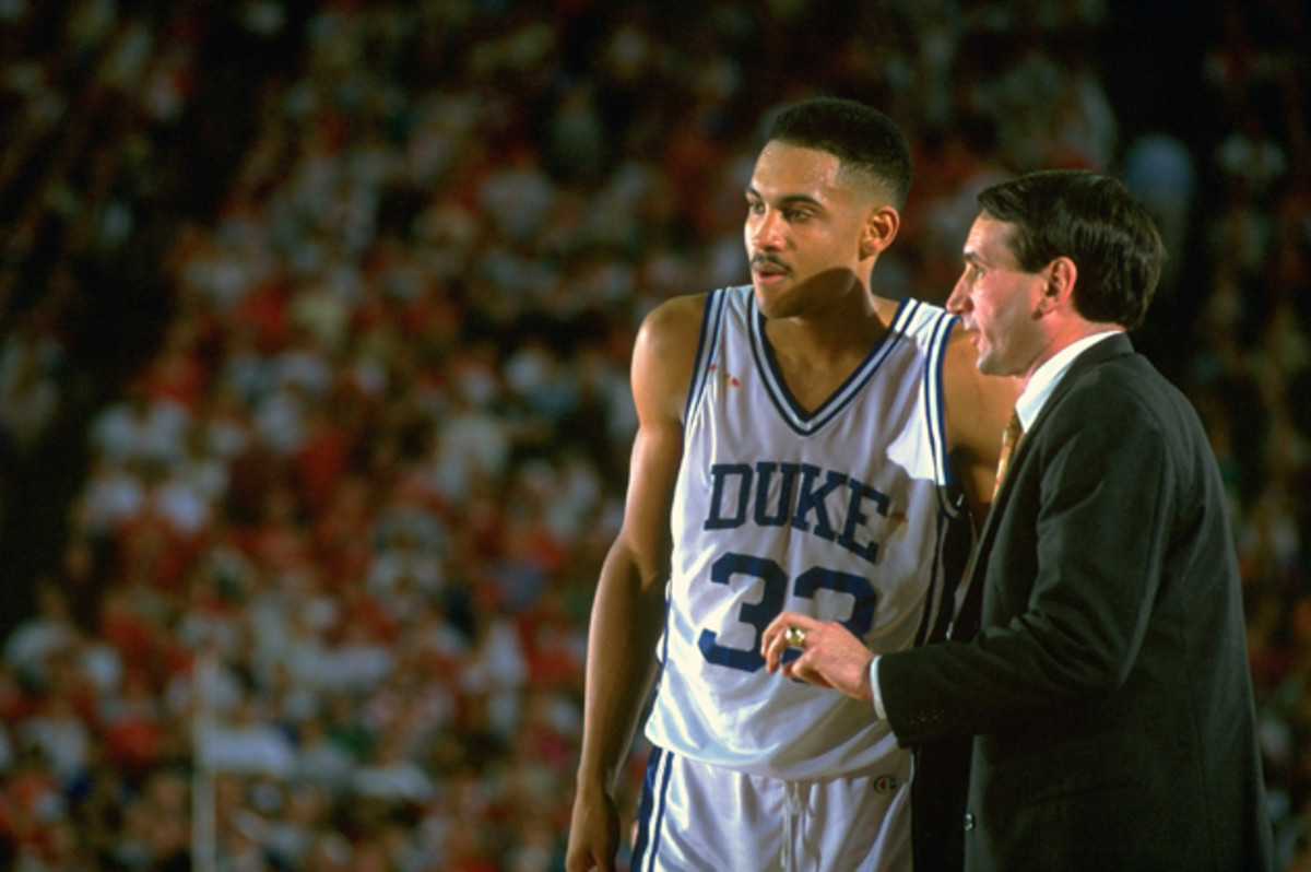 Duke coach Mike Krzyzewski talking to player Grant Hill during a game against the Indiana Hoosiers at H.H. Humphrey Metrodome during the 1992 NCAA National Semifinals.