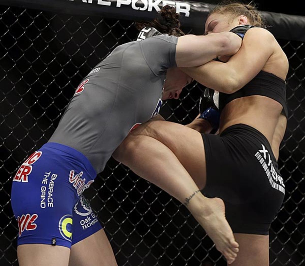 Ronda Rousey wins in UFC 170