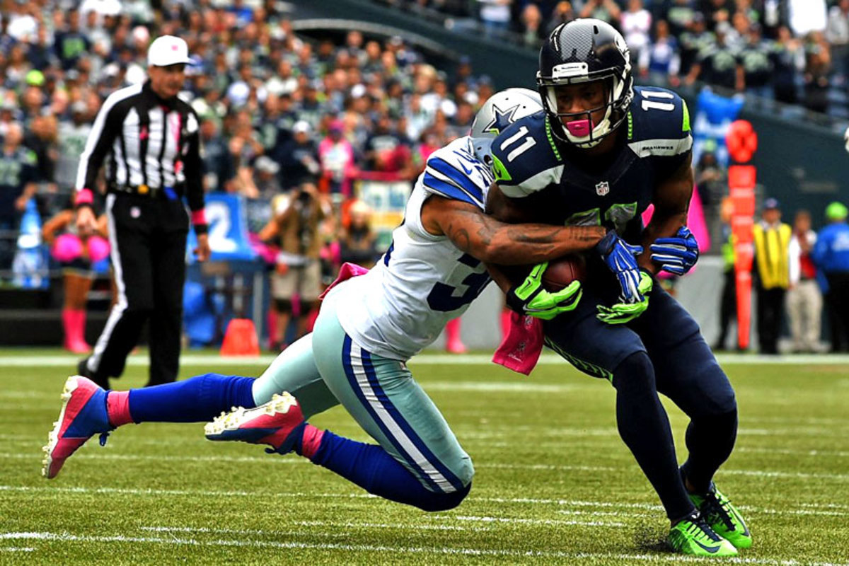 Thanks to the swarming play by Orlando Scandrick and the Dallas defense, Percy Harvin had no room to run in Week 6. (John W. McDonough/SI/The MMQB)