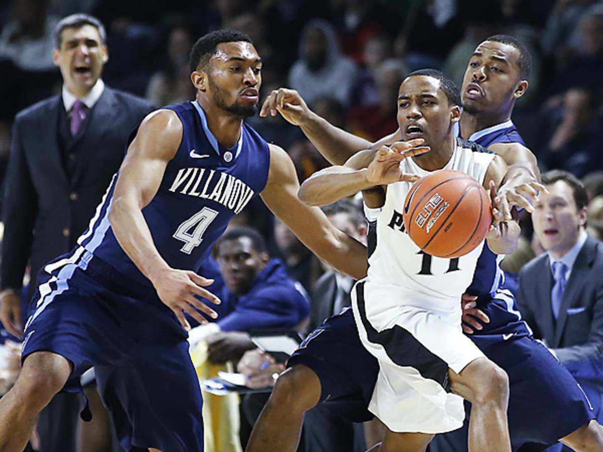 Providence's Bryce Cotton (11) was superb against Villanova, but the Friars couldn't finish the upset. (Elise Amendola/AP)