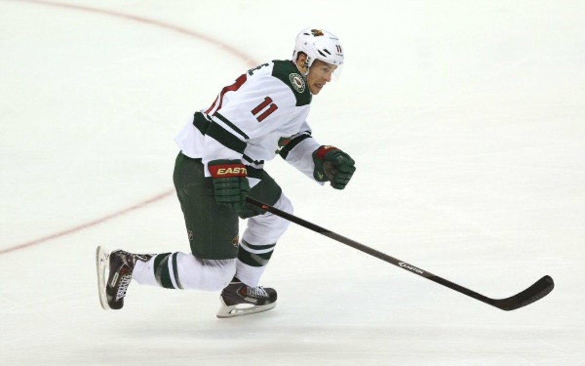 Wild's Zach Parise reached -- and surpassed -- the 500 career points mark Saturday night. (Victor Decolongon/Getty Images)