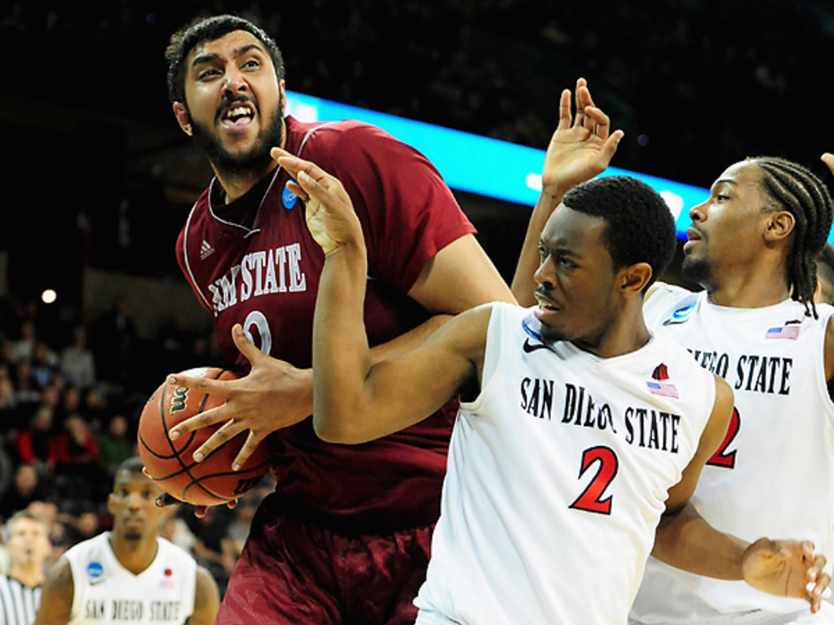 Sim Bhullar and New Mexico State came close to that elusive tourney win, but fell short again. (Steve Dykes/Getty Images)