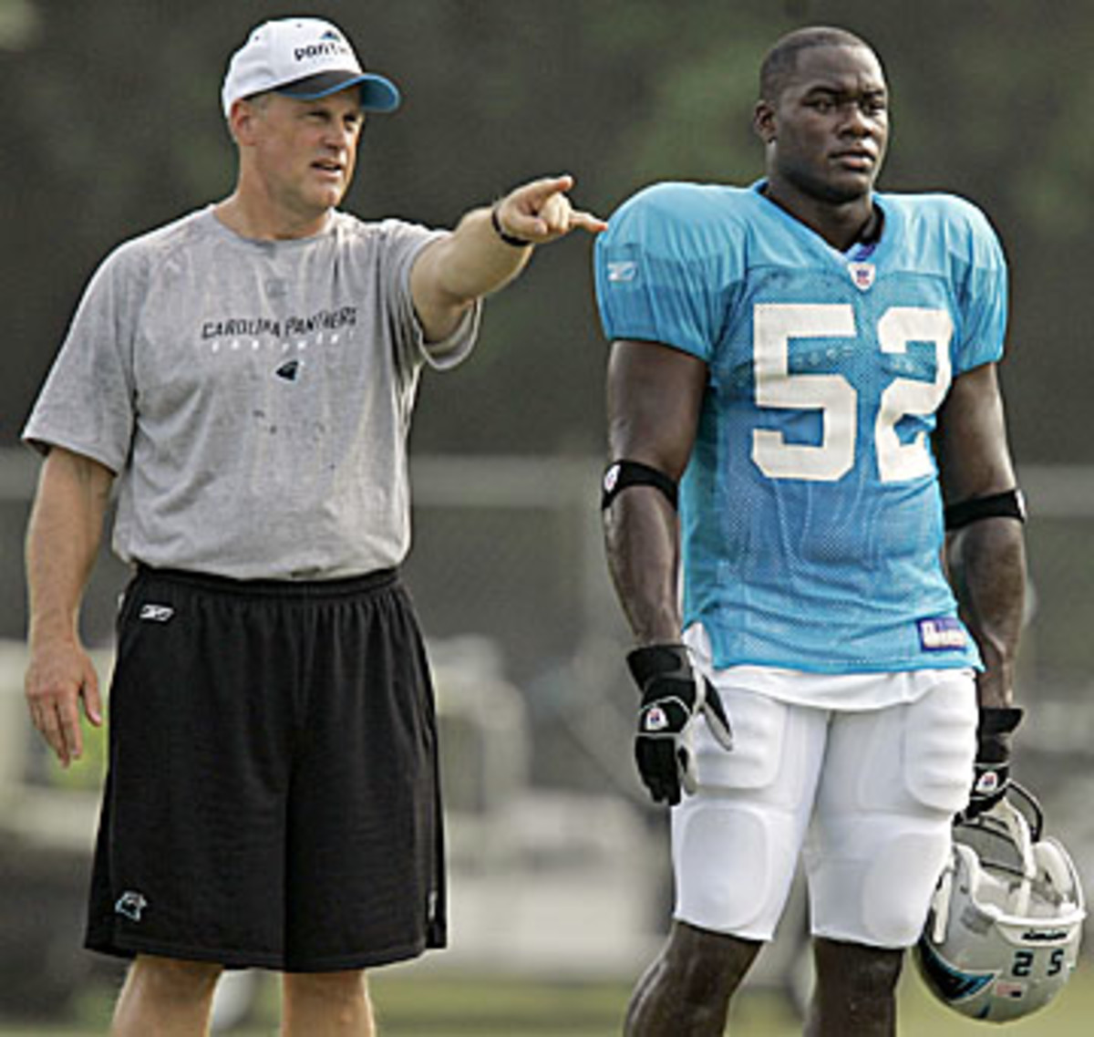 Carolina was the longest stop of Flajole's NFL career. He served on John Fox's staff for five years, and helped bring along young stars like Jon Beason (here, in 2007). (Chuck Burton/AP)