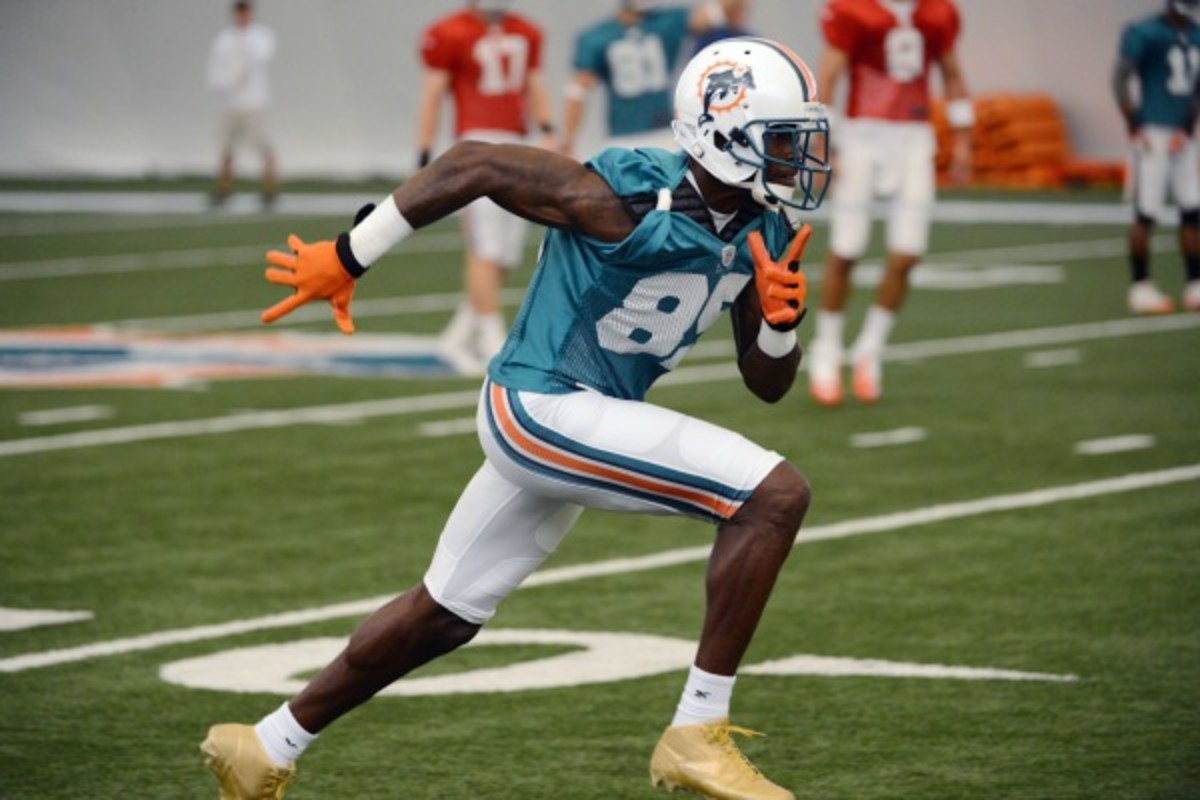 Chad Johnson's last stint in the NFL came in Dolphins' training camp in 2012. (Ron Elkman/Getty Images)