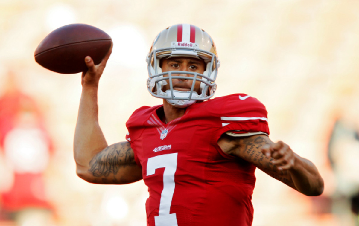 Colin Kaepernick threw 21 touchdowns and 8 interceptions in 2013. (Brian Bahr/Getty Images)