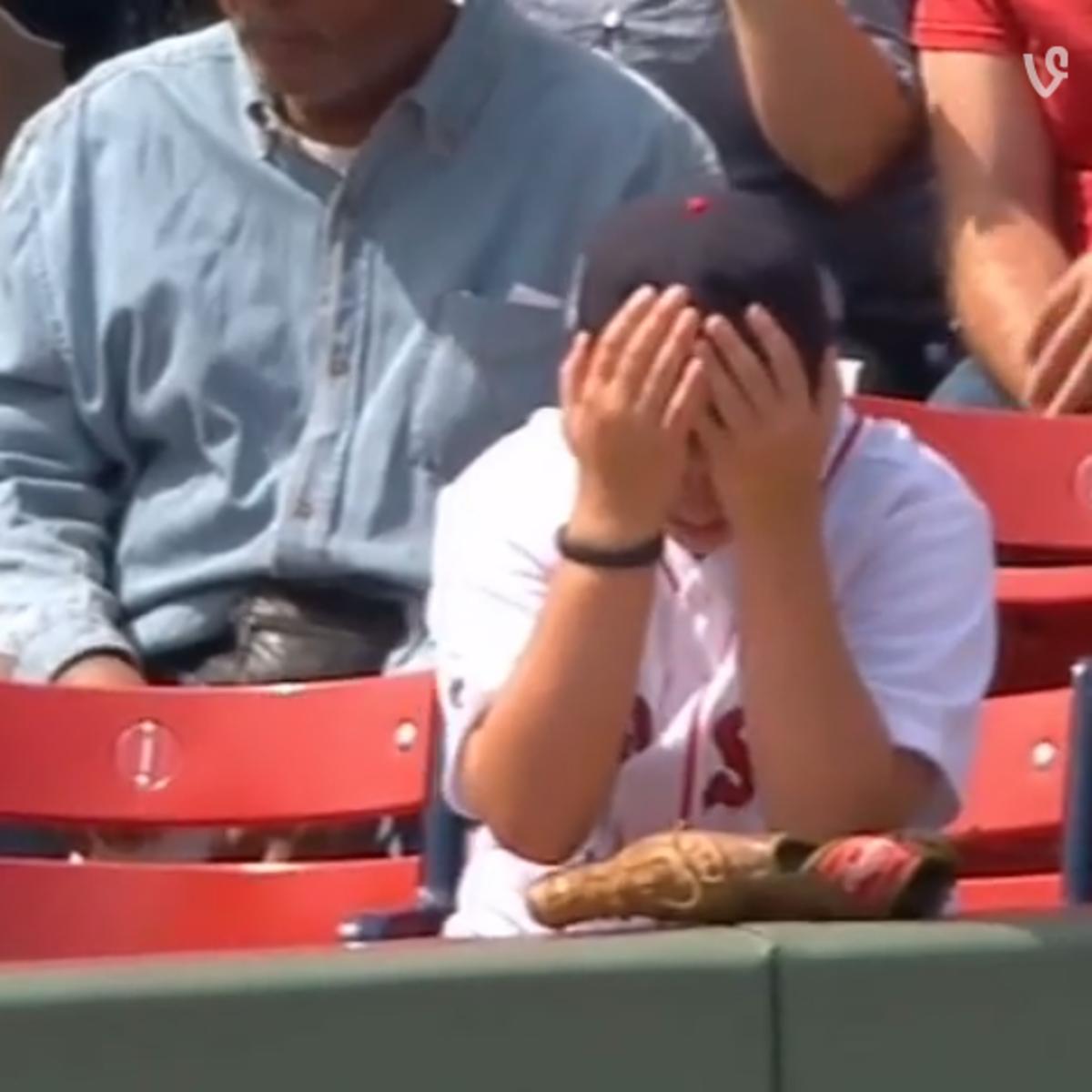 Young Red Sox fan cries after fielding fair ball - Sports Illustrated