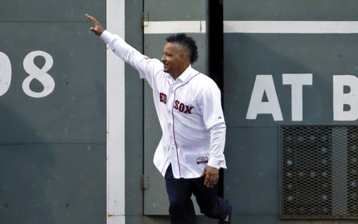 Former Red Sox outfielder Manny Ramirez waves to the Boston faithful. (AP Photo/Elise Amendola)