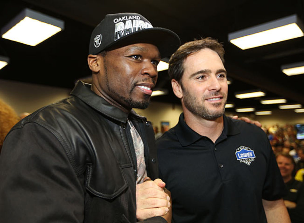 NASCAR fan 50 Cent (here with Jimmie Johnson) is about to have a higher profile in the sport.