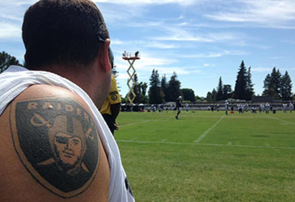 Raiders fans wear their hearts on their sleeves. (Robert Klemko/The MMQB)