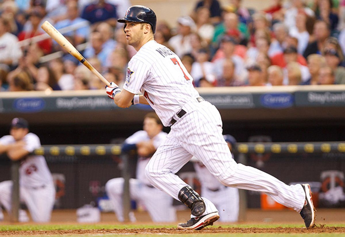 Joe Mauer will be moved permanently to first base, but he maintains catcher eligibility for the season.