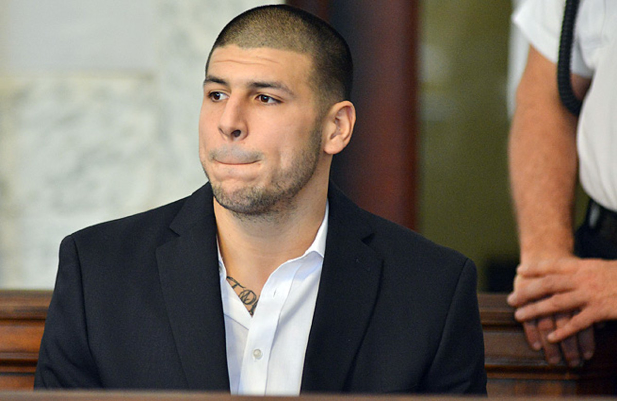 Aaron Hernandez signed a $40M extension just weeks after an alleged double murder in Massachusetts.