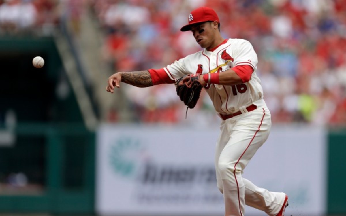 t. Louis Cardinals second baseman Kolten Wong throws to first during the second inning of a baseball game against the Chicago Cubs Saturday, April 12, 2014, in St. Louis. (AP Photo/Jeff Roberson)