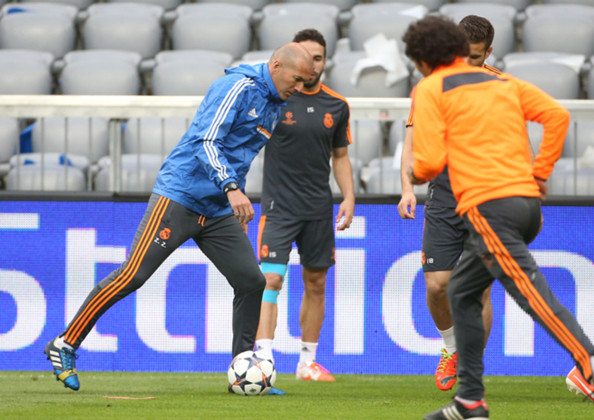 Former France great and current Real Madrid assistant coach Zinedine Zidane, left, will not be going to coach Bordeaux.