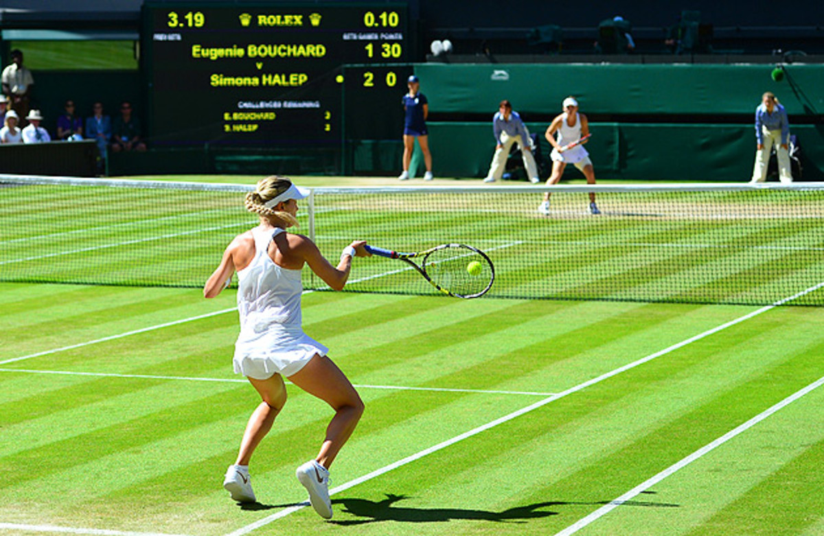 Simona Halep (right) jumped up to a 2-1 lead against Eugenie Bouchard in the first set of their semifinal match at Wimbledon.