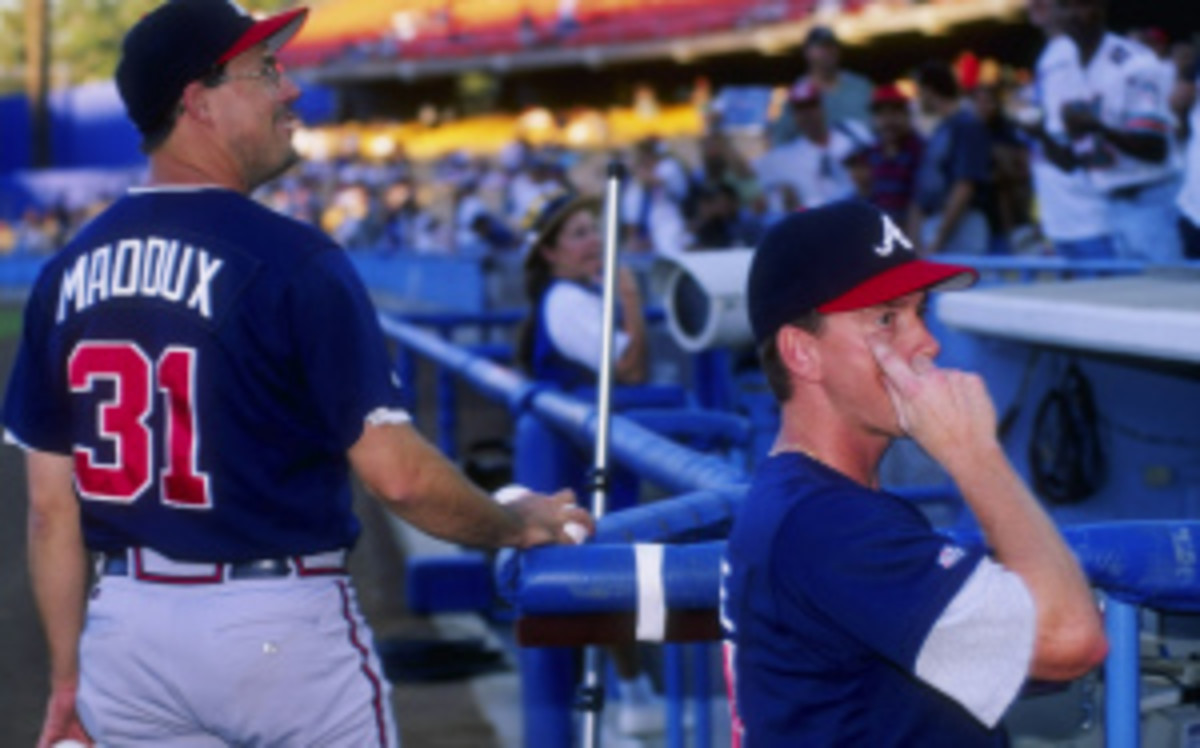 Tom Glavine and Greg Maddux, who won 660 games together, become the first pair since Cal Ripken Jr. and Tony Gwynn in 2007 to be inducted into the Baseball Hall of Fame their first time on the ballot. (Harry How/Getty Images)