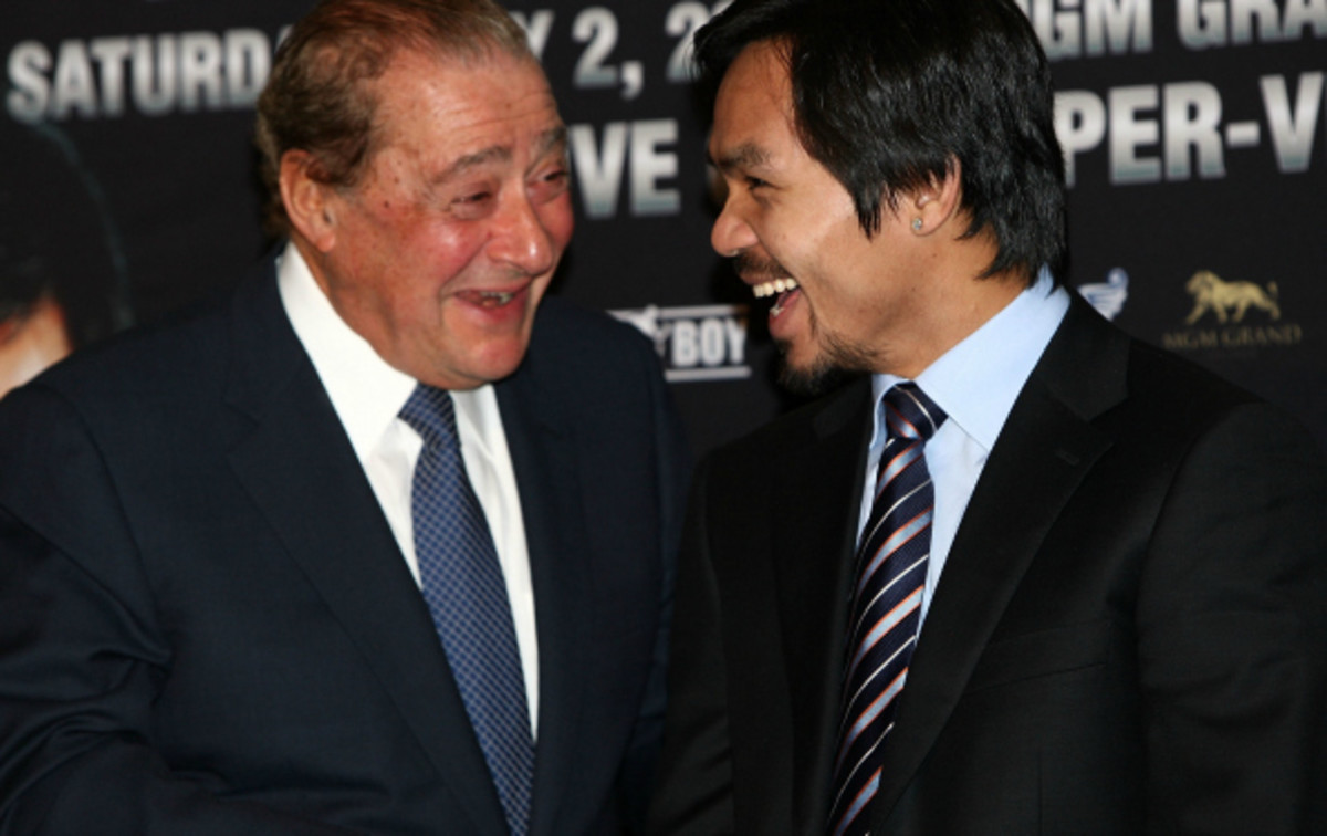Manny Pacquiao is represented by Bob Arum's Top Rank Promotions. (Alberto E. Rodriguez/Getty Images)