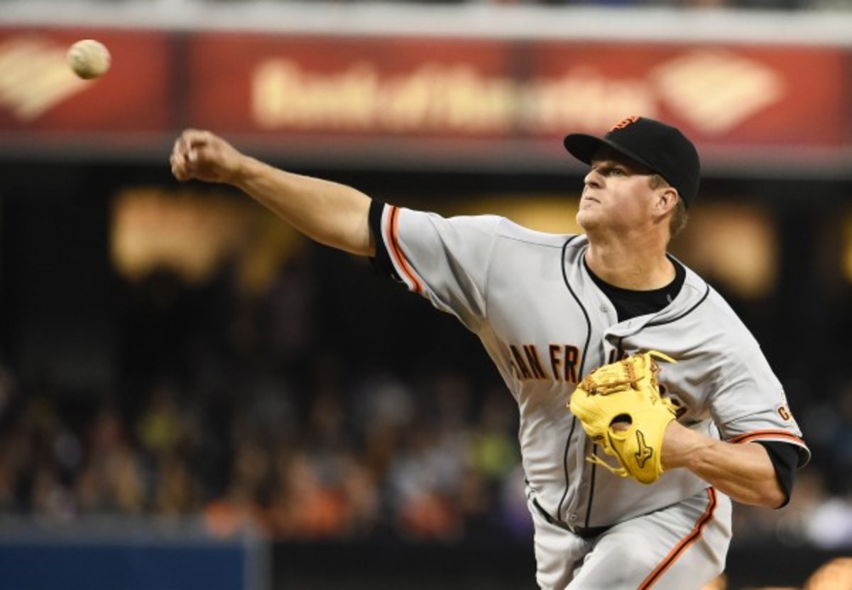 Matt Cain was not throwing at all to avoid opening up the wound on his sliced finger. (Denis Poroy/Getty Images)