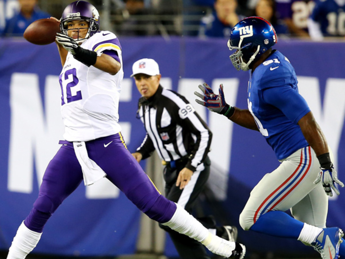 Josh Freeman misfired on 33 of his 53 passes in his Vikings debut, a 23-7 loss to New York. (Elsa/Getty Images)