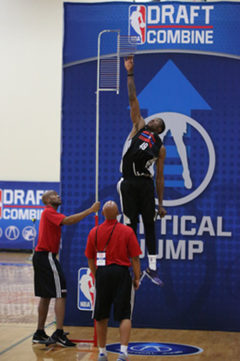 Thanasis Antetokounmpo participates in the vertical jump test during the 2014 Draft Combine in Chicago, Illinois.