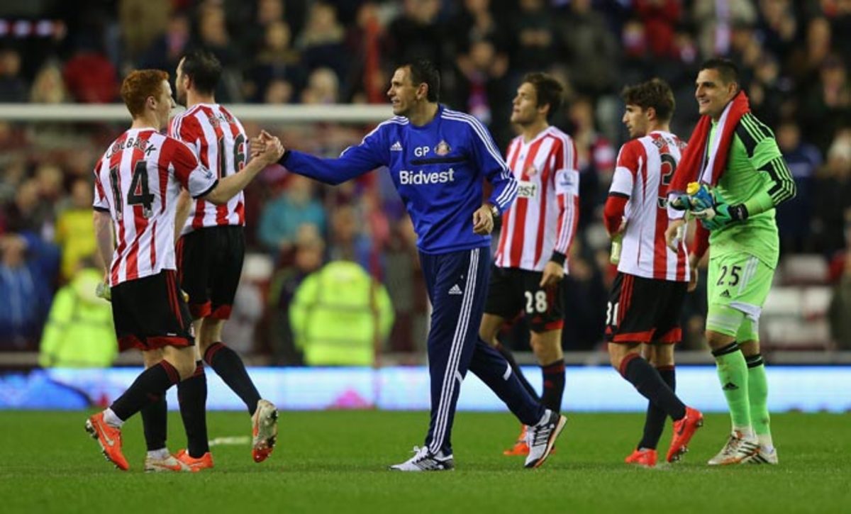 Manager Gus Poyet (center) led Sunderland to Premier League safety after a disastrous start and has signed a new two-year deal to remain with the club.