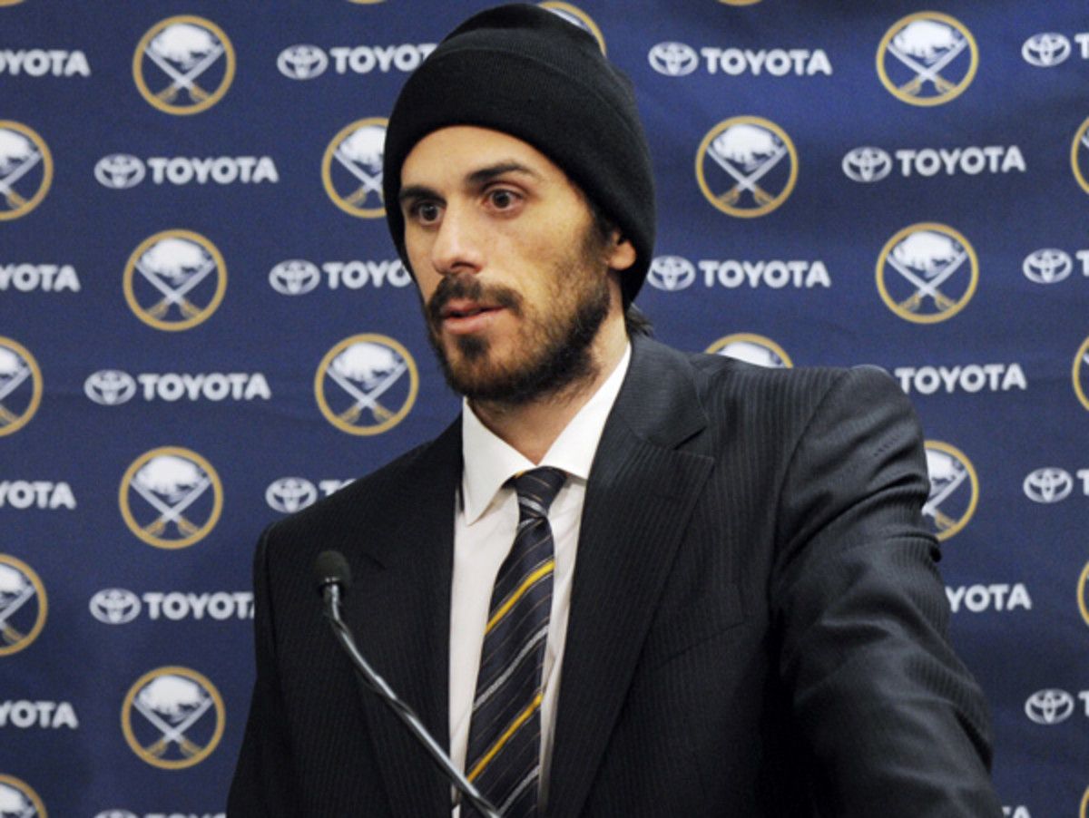 Ryan Miller addresses the press after his trade from Buffalo to St. Louis. (Gary Wiepert/AP)