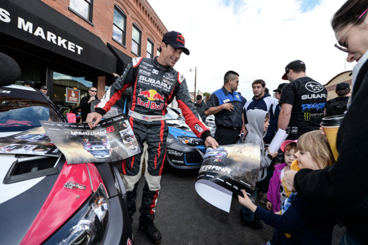 Travis Pastrana signs autographs for fans at the Oregon Trail Rally in Hood River, Oregon in May 2014.