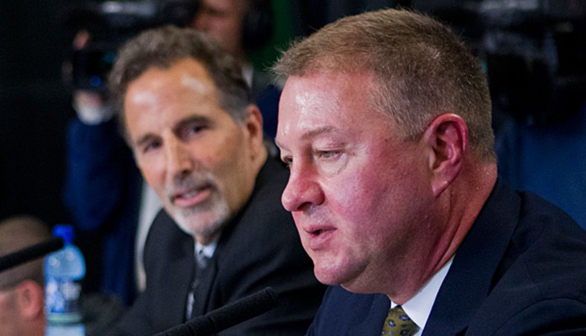 Coach John Tortorella and fired GM Mike Gillis of the Vancouver Canucks.