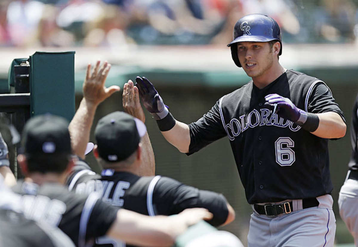 With Carlos Gonzalez on the DL, Corey Dickerson (right) should get a chance to stand out in the Rockies' loaded lineup.