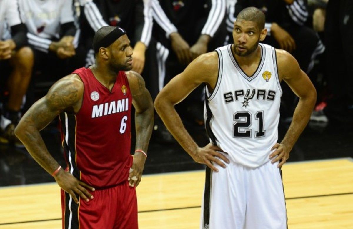 Tim Duncan has career averages of 20 points, 11.2 rebounds, 3.1 assists and 2.2 blocks per game. (Frederic J. Brown/Getty Images)