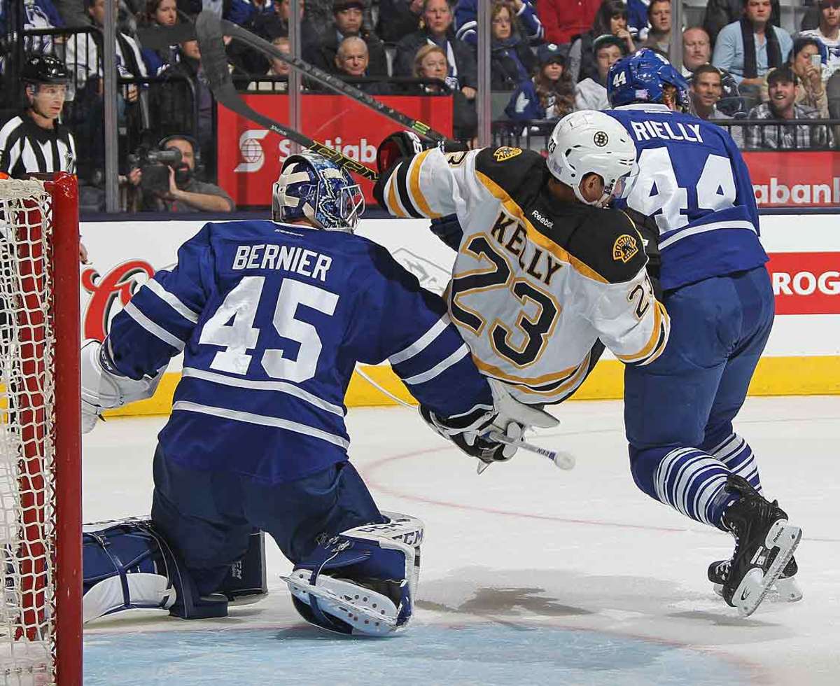 12.bruins-leafs-check.jpg