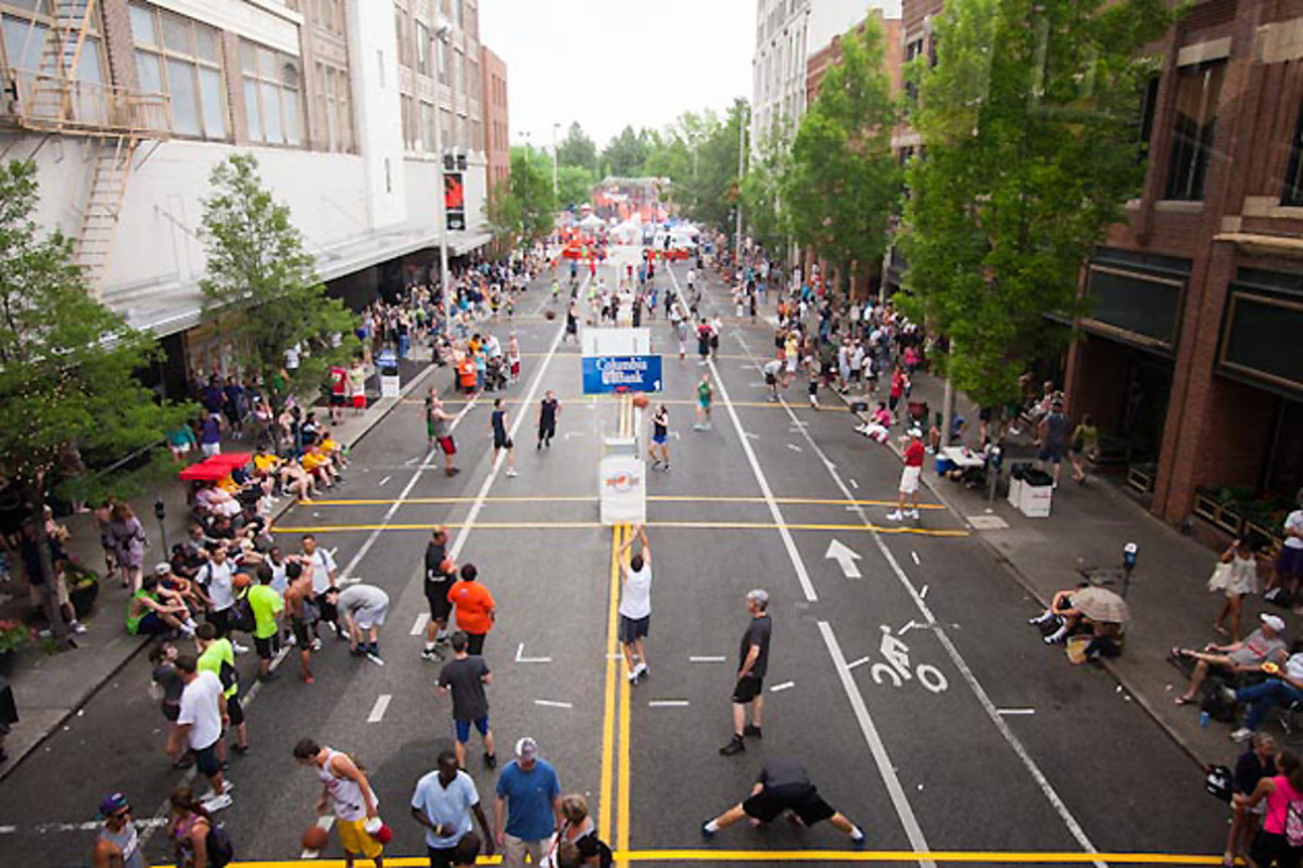 Hoopfest officials use eight miles of road tape to block off courts for the nearly 7,000 teams that participate.