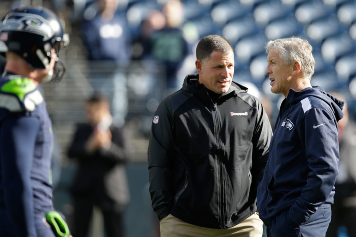 Schiano with Carroll before a game in 2013. (Elaine Thompson/AP)