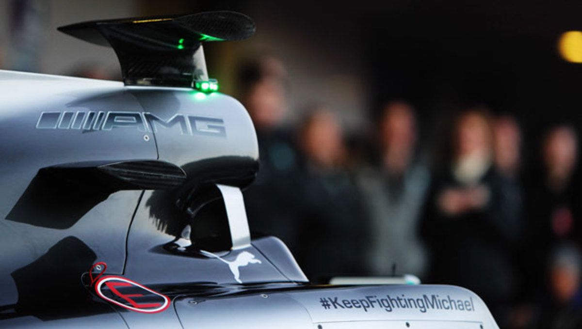 Mercedes' new F1 car bears a message for racing legend Michael Schumacher, who remains in a coma.