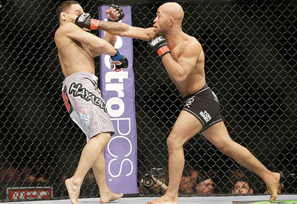 Demetrious Johnson (right) has shown intriguing skills but not an ability to win overs fans.