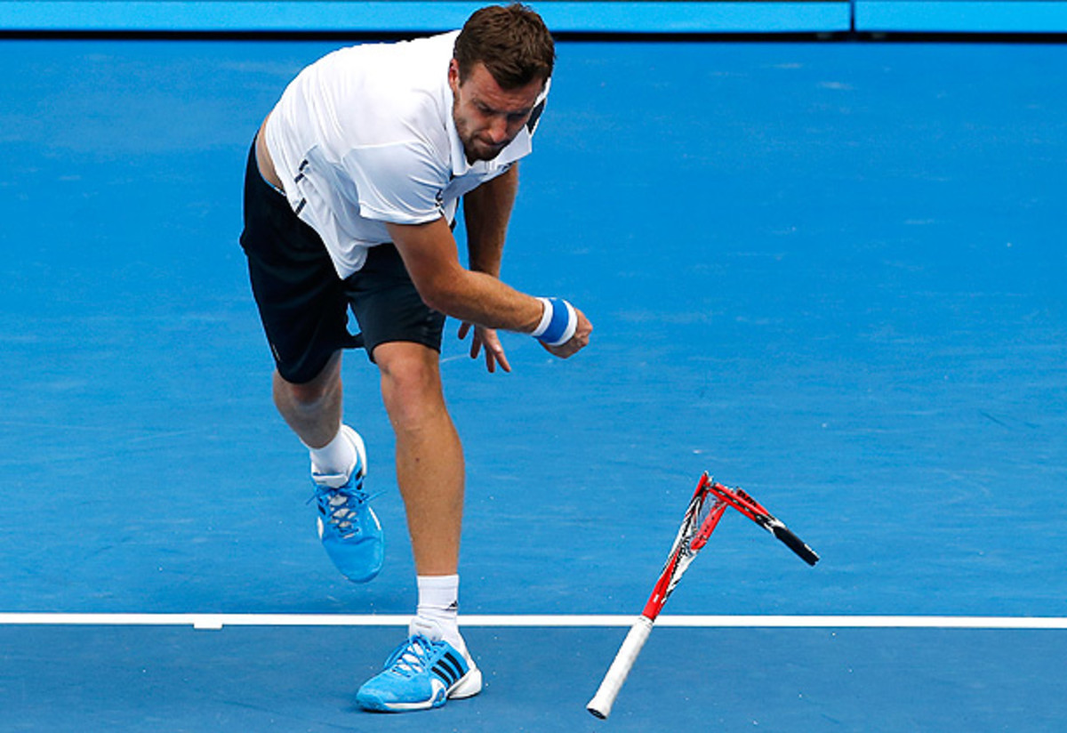Two matches, two smashed rackets for Ernests Gulbis. (Eugene Hoshiko/AP)