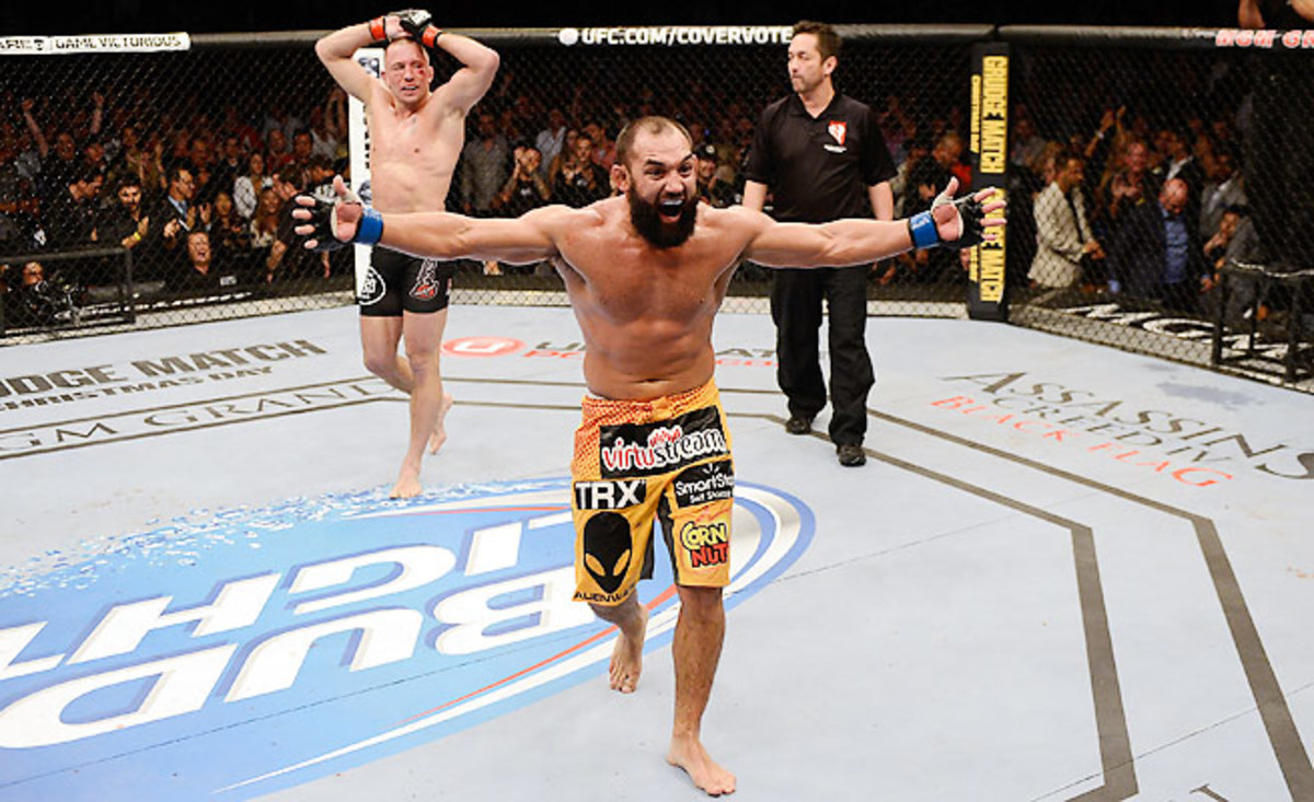 It was premature celebration for Johny Hendricks, who later fell to his knees when a controversial split decision went Georges St-Pierre's way in November.