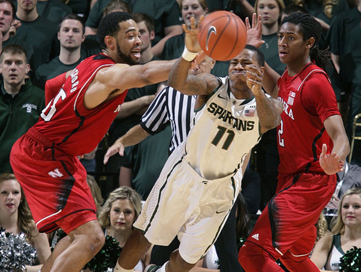 Keith Appling (11) and Michigan State had a hard time breaking through Nebraska's defense. (Al Goldis/AP)