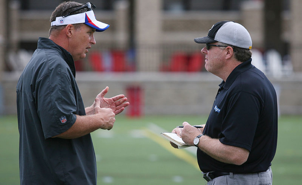 King with Bills coach Doug Marrone at training camp in 2013. (Bill Wippert/AP)