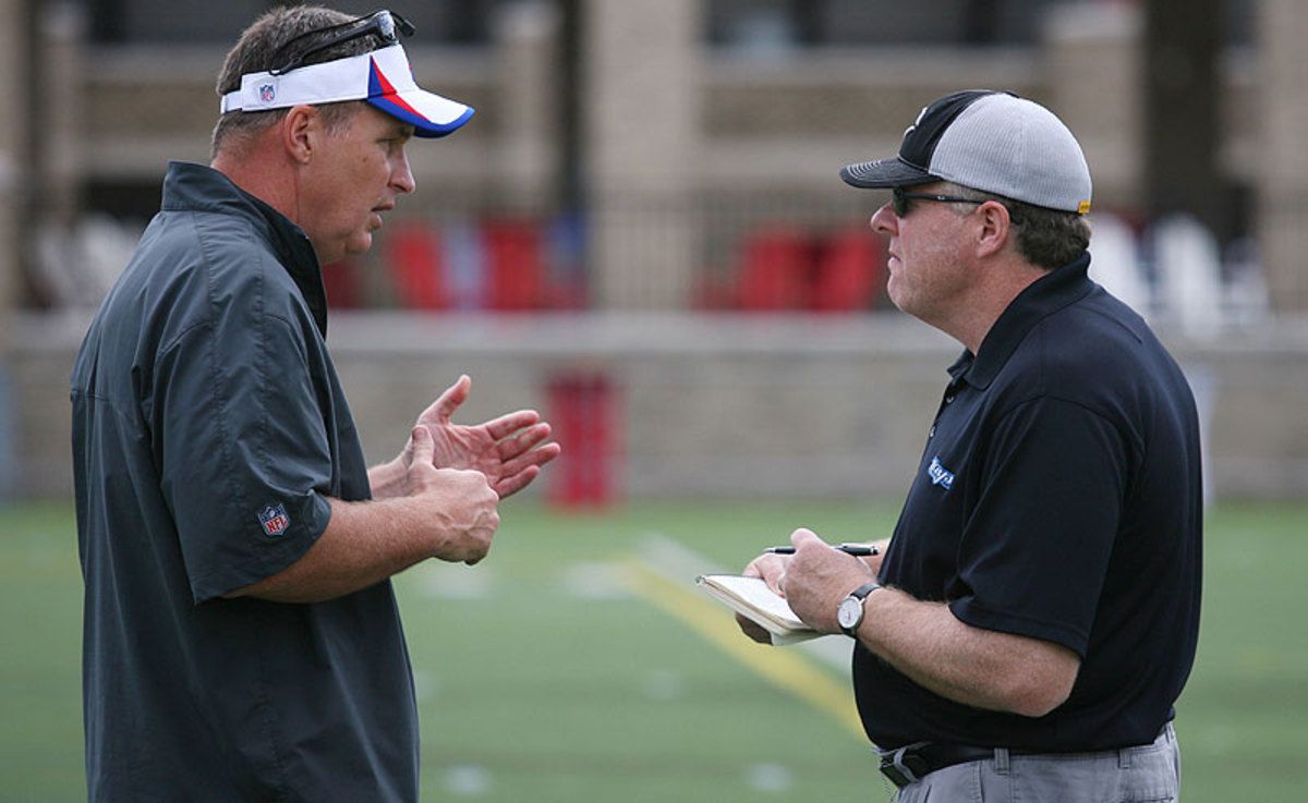King with Bills coach Doug Marrone at training camp in 2013. (Bill Wippert/AP)