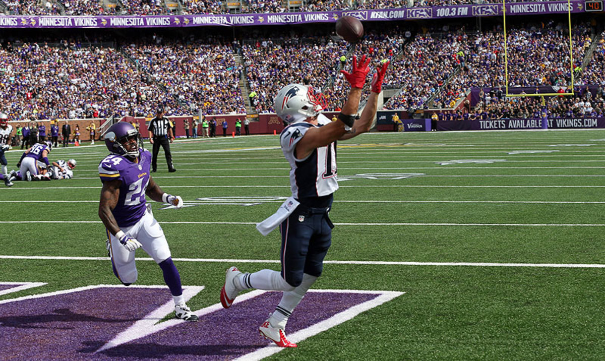 Julian Edelman's touchdown catch was one of many things to like about the Patriots in their 30-7 win over the Vikings. (Jim Mone/AP)