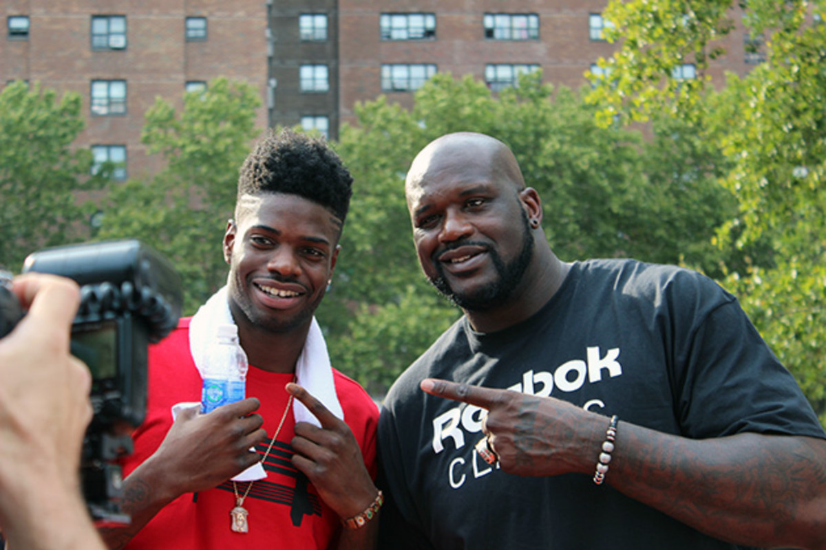 Shaquille O'Neal poses for a photo with 76ers big man Nerlens Noel.