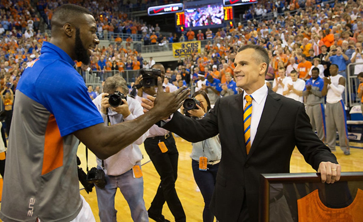 After a frustrating freshman season, Florida's Patric Young (left) bought into Billy Donovan's system.