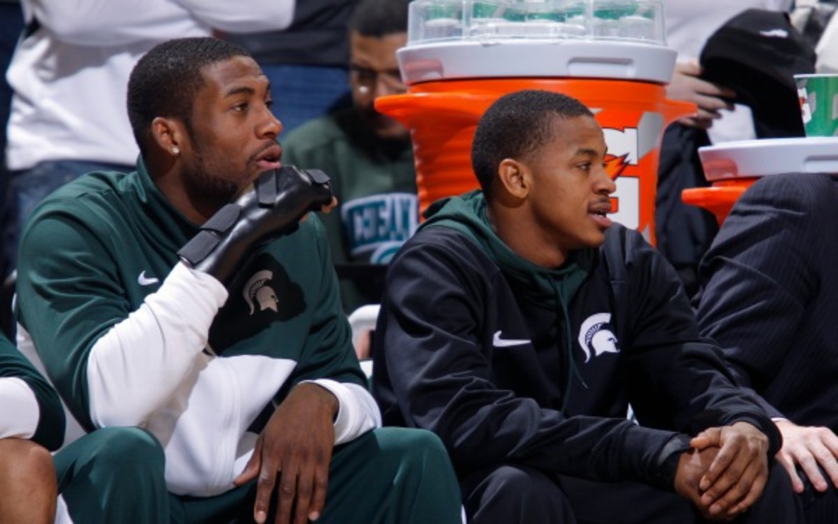 Michigan State guard Keith Appling (right) is averaging 15 points a game this season. (AP Photo/Al Goldis)