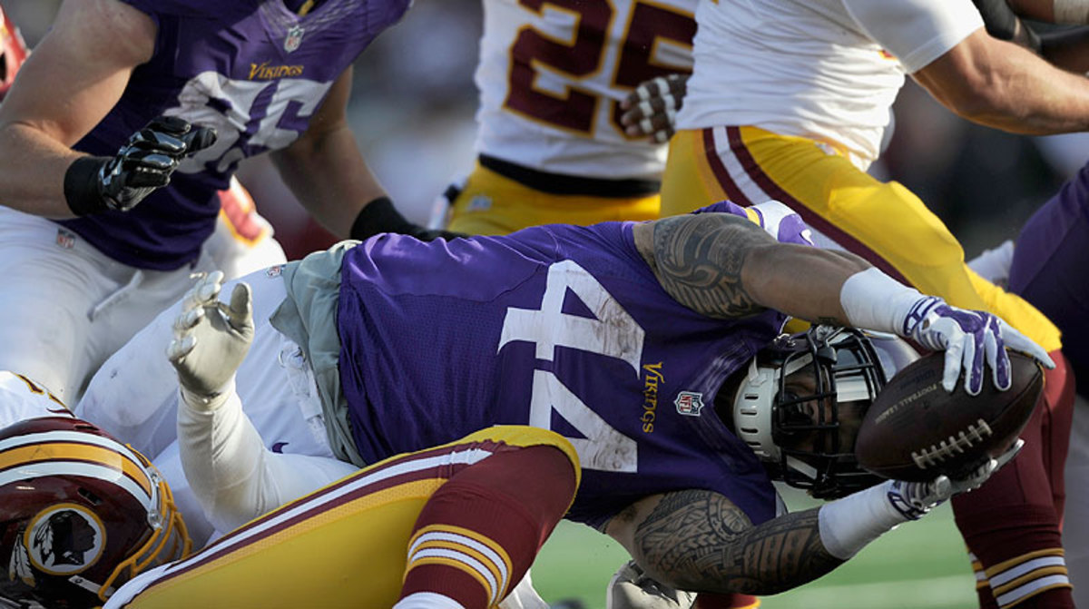 Matt Asiata scored three touchdowns in the Vikings' 29-26 win over Washington on Sunday. (Hanna Foslien/Getty Images)
