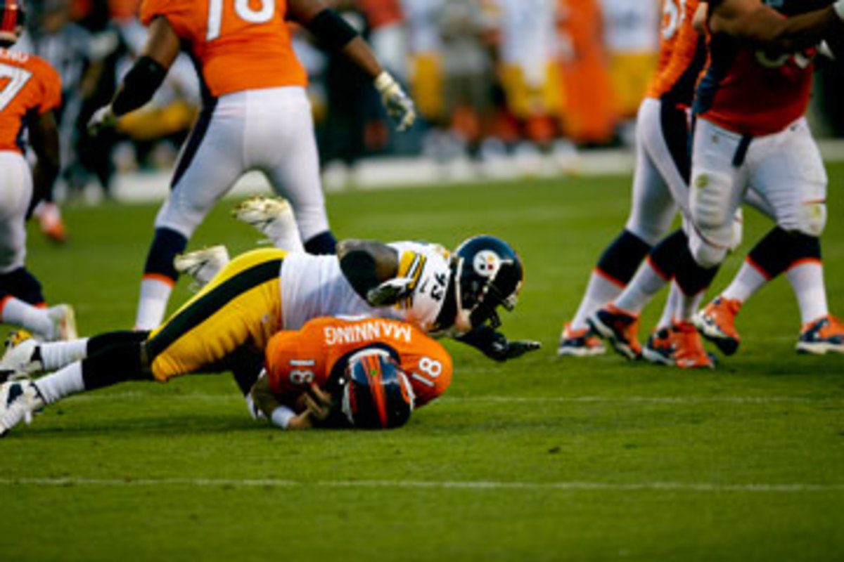 Jason Worilds putting a hit on Peyton Manning. (Peter Read Miller/Sports Illustrated/The MMQB)